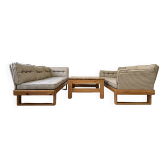 Two vintage Swedish sofas and a pine table