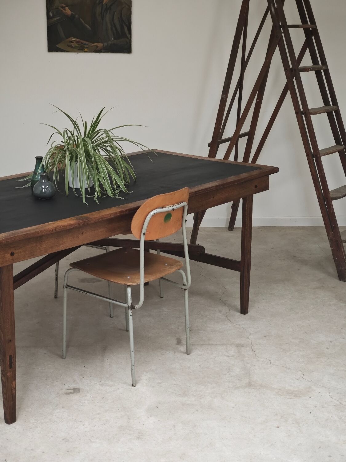 Vintage workshop folding table in oak with a hand-patinated black top.