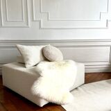 Square ottoman and its cushions in buckle fabric