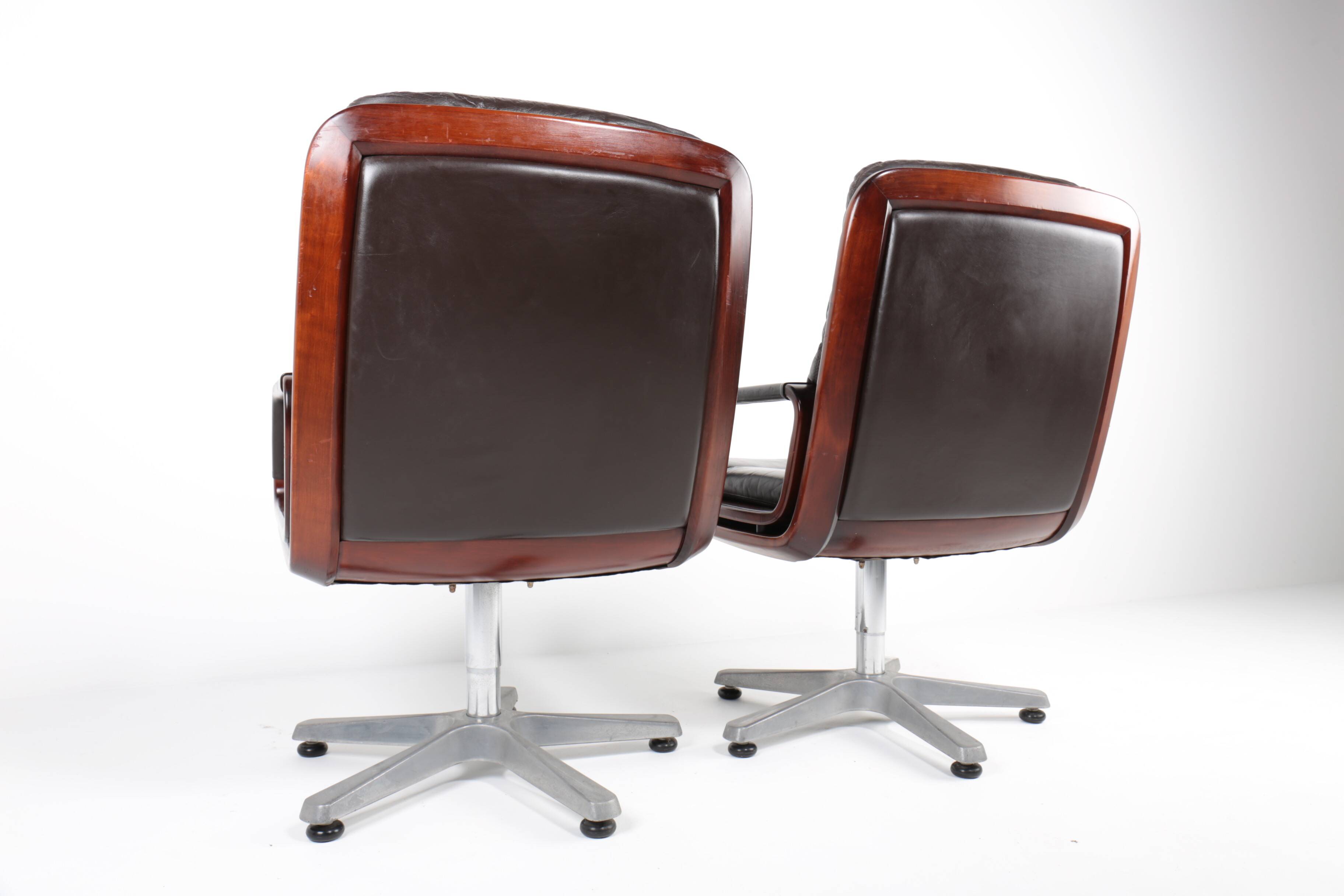Pair of leather visitor armchairs by Eugen Schmidt