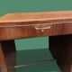 Rectangular veneered wooden desk in Art Deco style. 1930s-1940s.