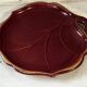 Mid-Century catchall in ruby red ceramic with gold trim – shape