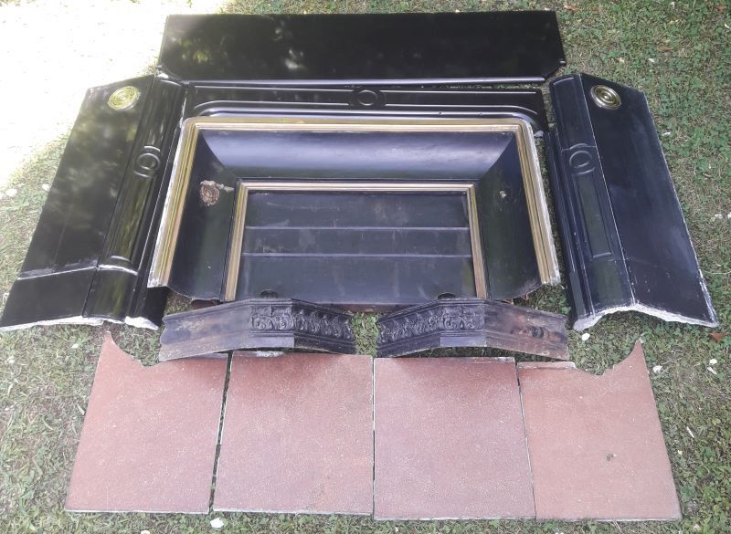 Fireplace XVIII° black marble louis XIV style with narrowed and floor slabs