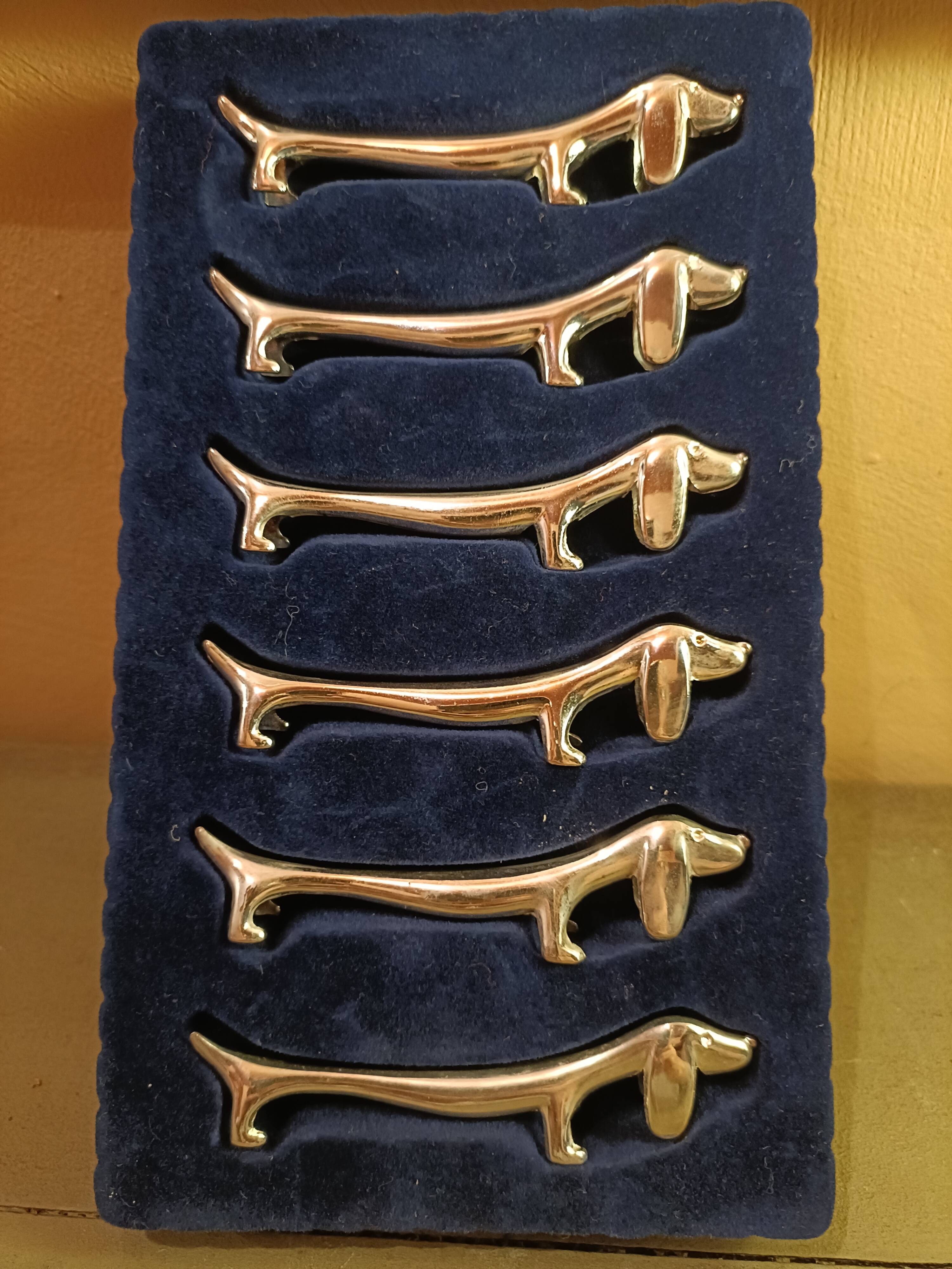 Porte couteaux métal argenté chien