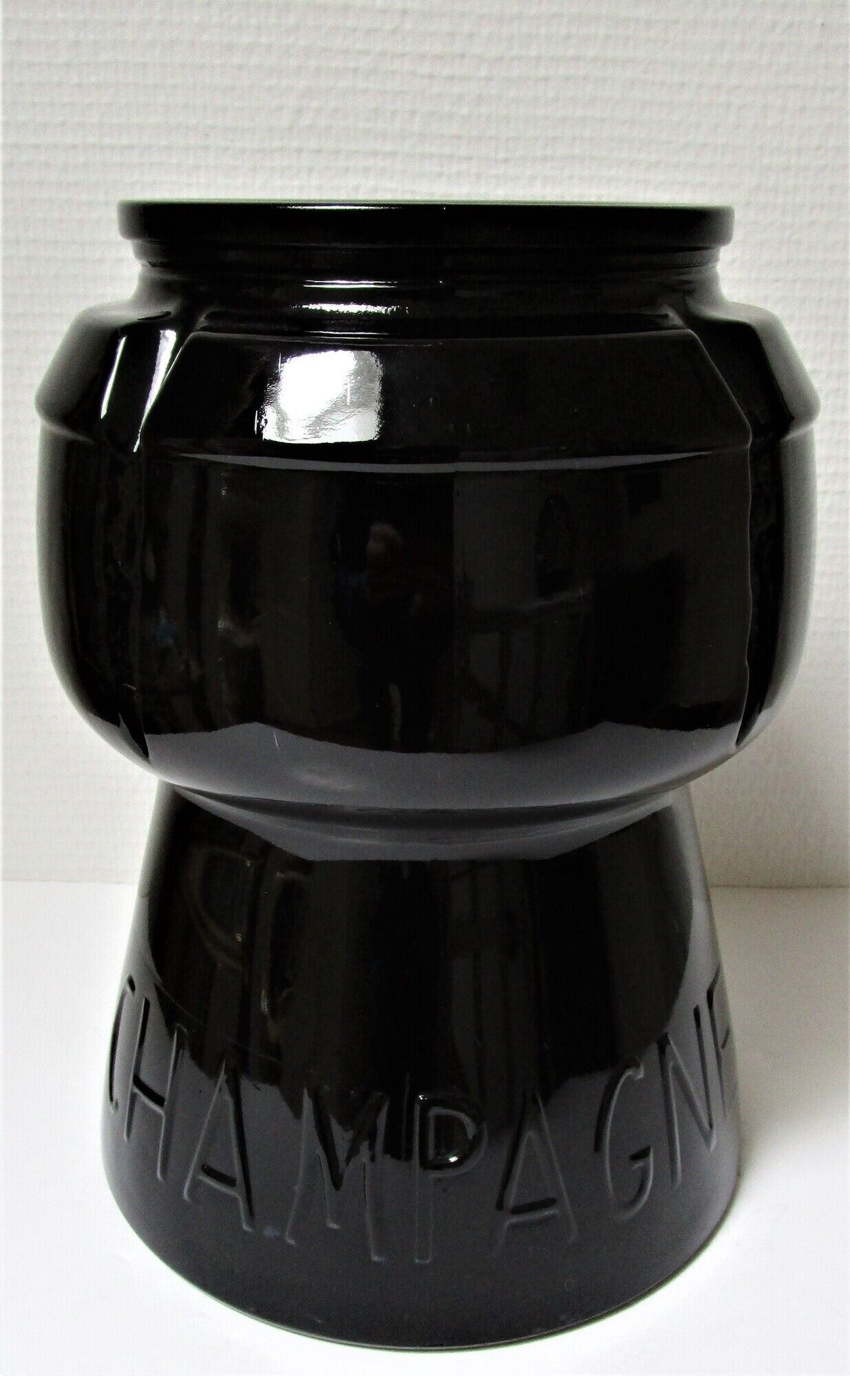 Champagne bucket design black glass in the shape of a 70s cork