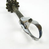 Sugar tongs in its case