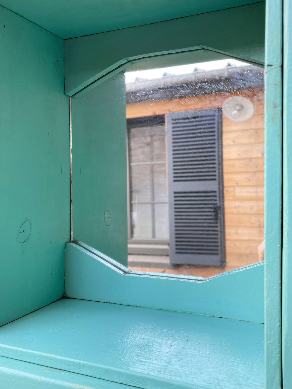 Old wall-mounted bathroom cabinet