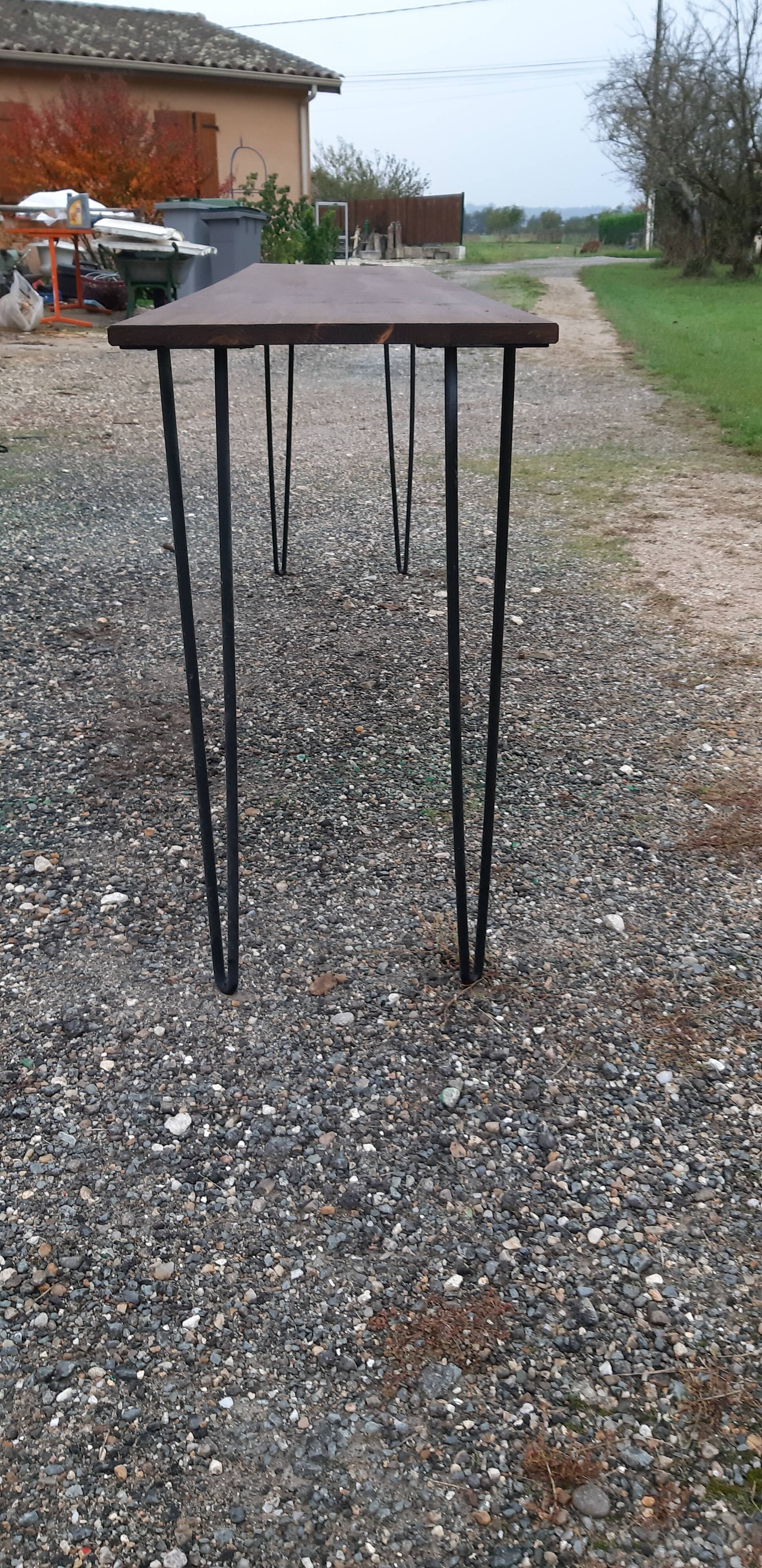 Console wood and metal with tapered legs.
