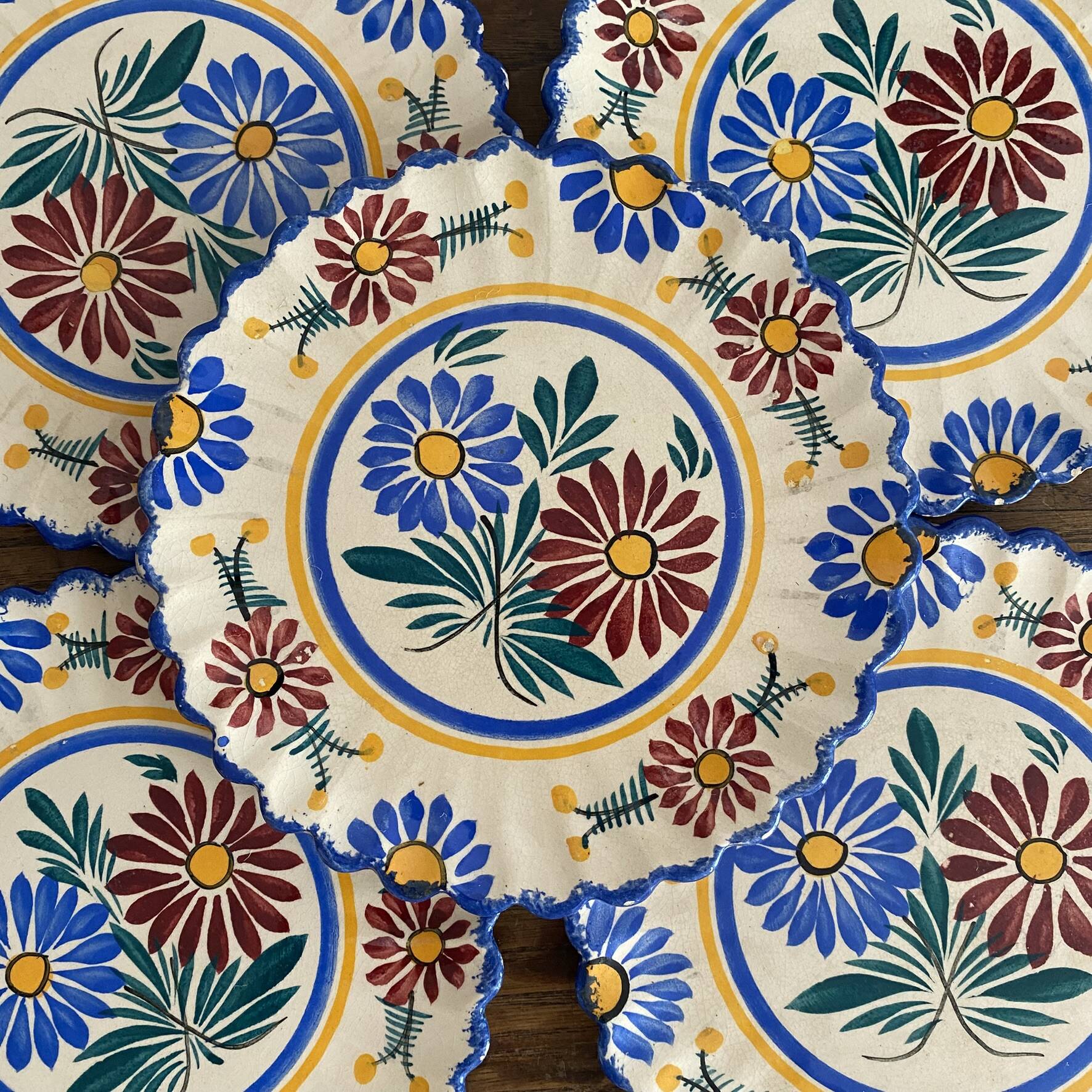 Henriot Quimper dessert plates, hand-painted earthenware.