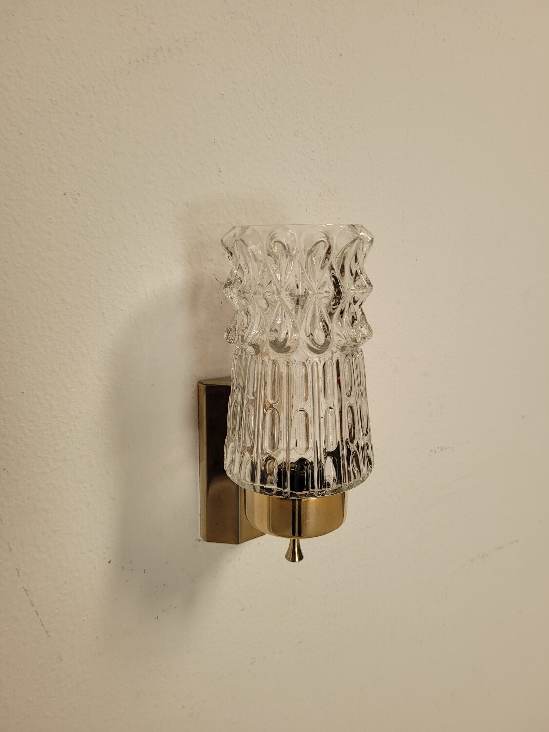Pair of vintage brass and glass wall lights from the 1960s