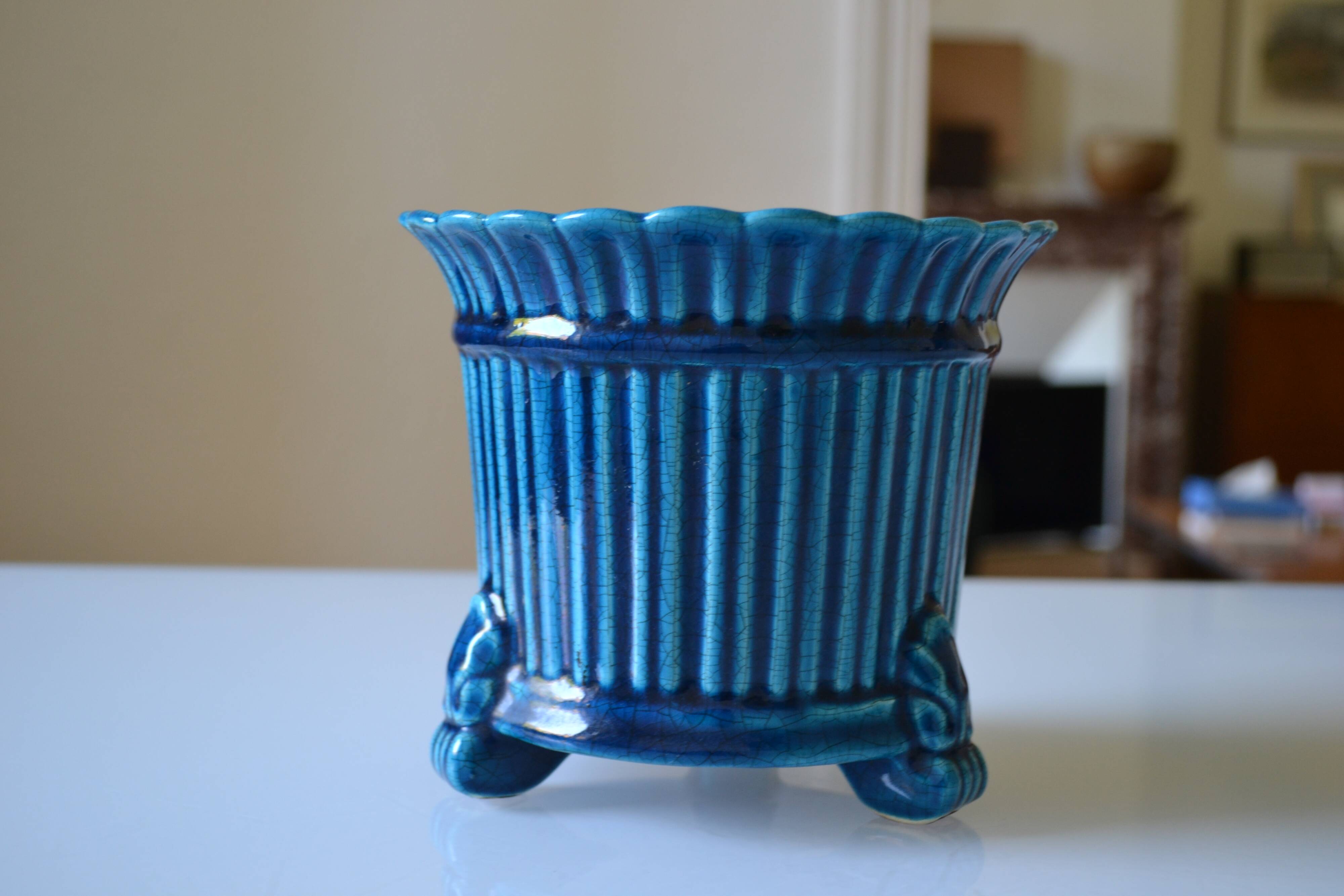 Cracked blue ceramic cache pot