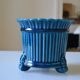 Cracked blue ceramic cache pot