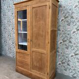 Display cabinet with hanging space