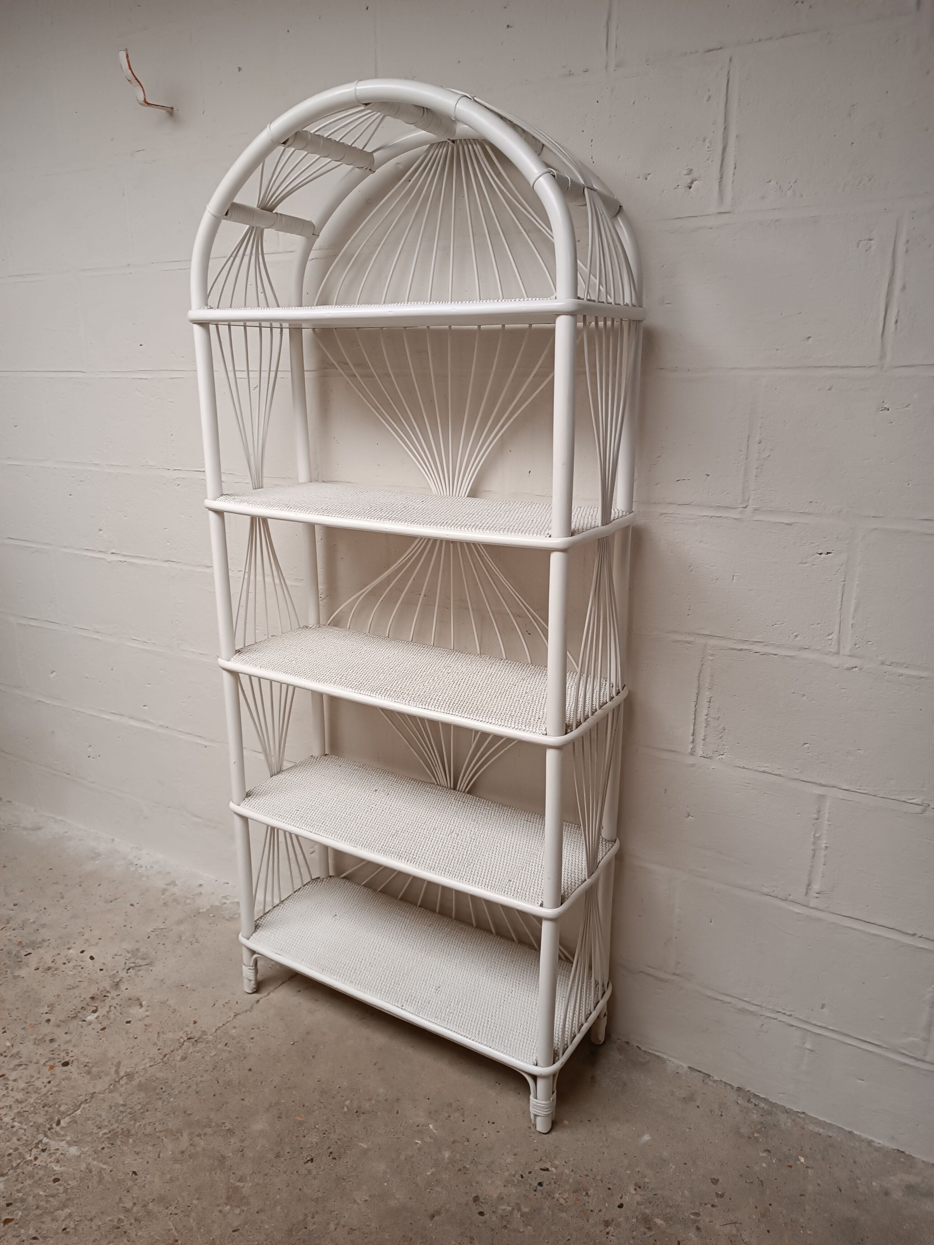 White lacquered rattan bookcase