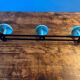 Metal coat rack with 3 hooks from the 70s