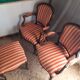 Pair of antique Louis XV style armchairs and ottoman.