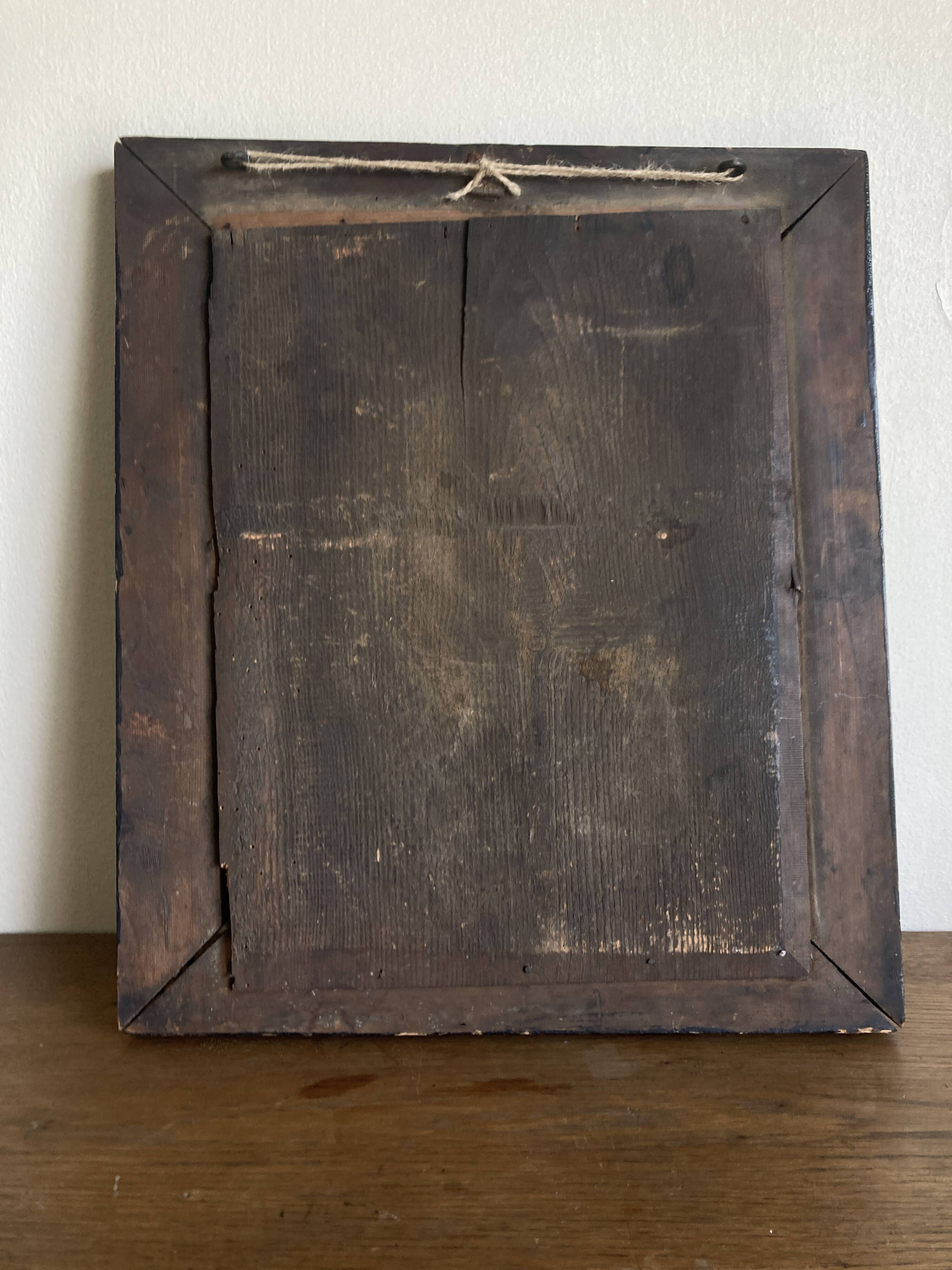19th century blackened mirror with pitted glass 34cm x 40cm