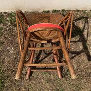Vintage 1970s armchair in curved woven chestnut + seat cushion
