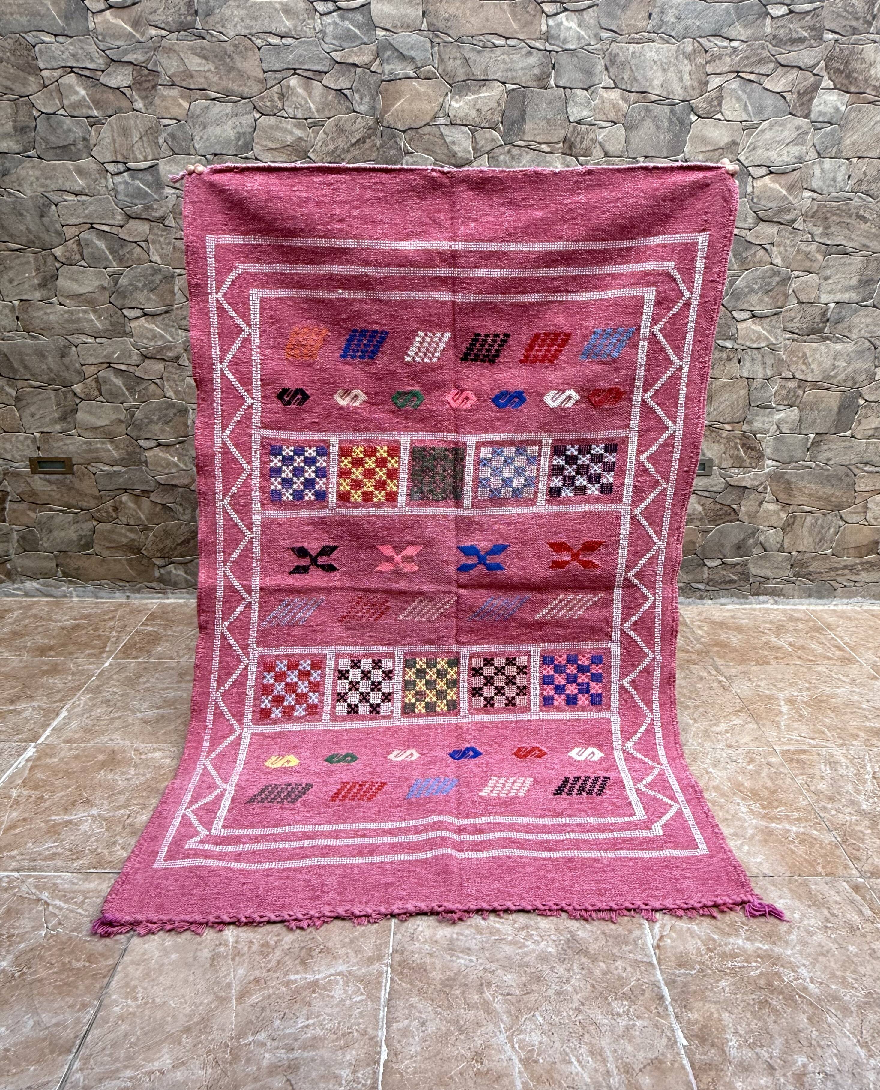 Handmade Moroccan wool rug: Berber Azilal style, geometric pattern.
