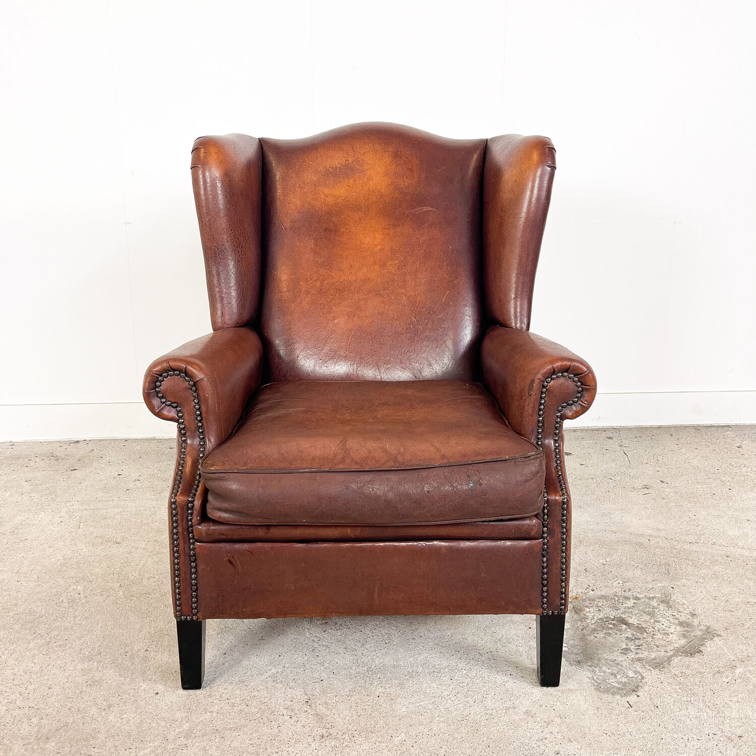 Vintage sheep leather wingback armchair, Druten