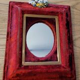 Kitsch red velvet mirror
