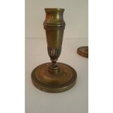 Pair of bronze candlesticks restoration style