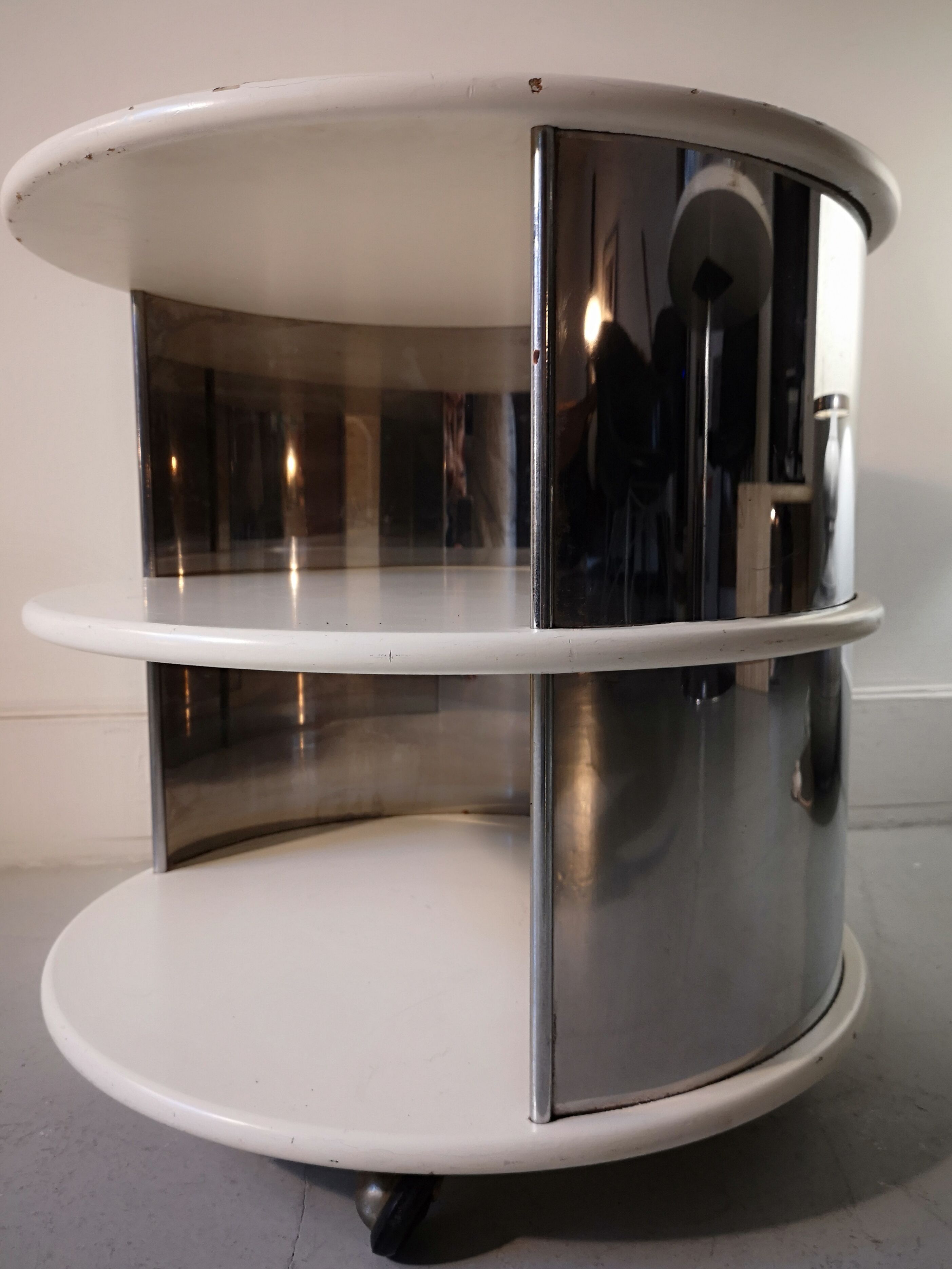 Pair of mirrored space age cylindrical bedside tables, 1960