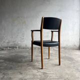 Set of 2 vintage beech wood armchairs with black skai upholstery — mid-century modern