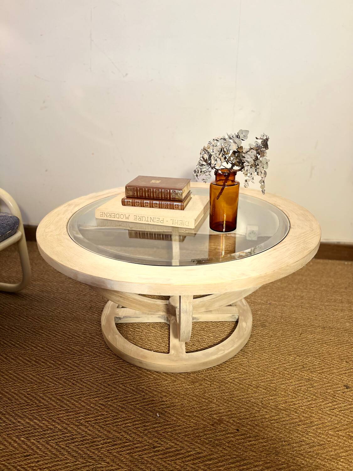 Oval patinated wood and beveled glass coffee table