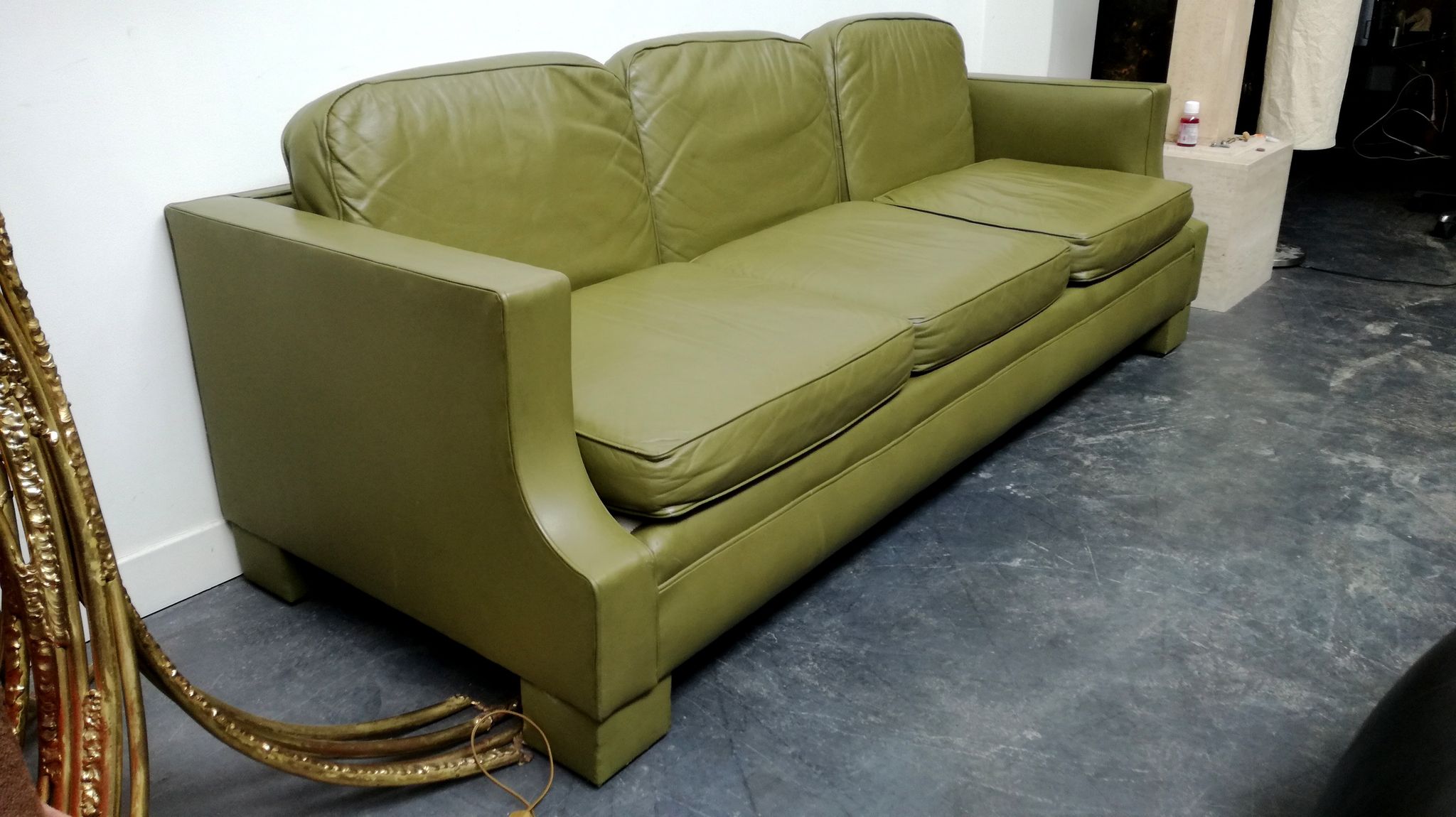 Jansen Olive green leather sofa France 1970