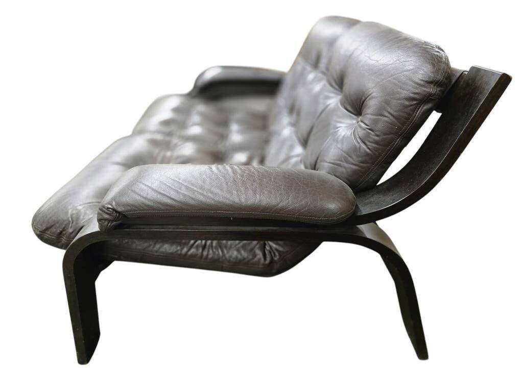 Vintage brown leather two-seater sofa