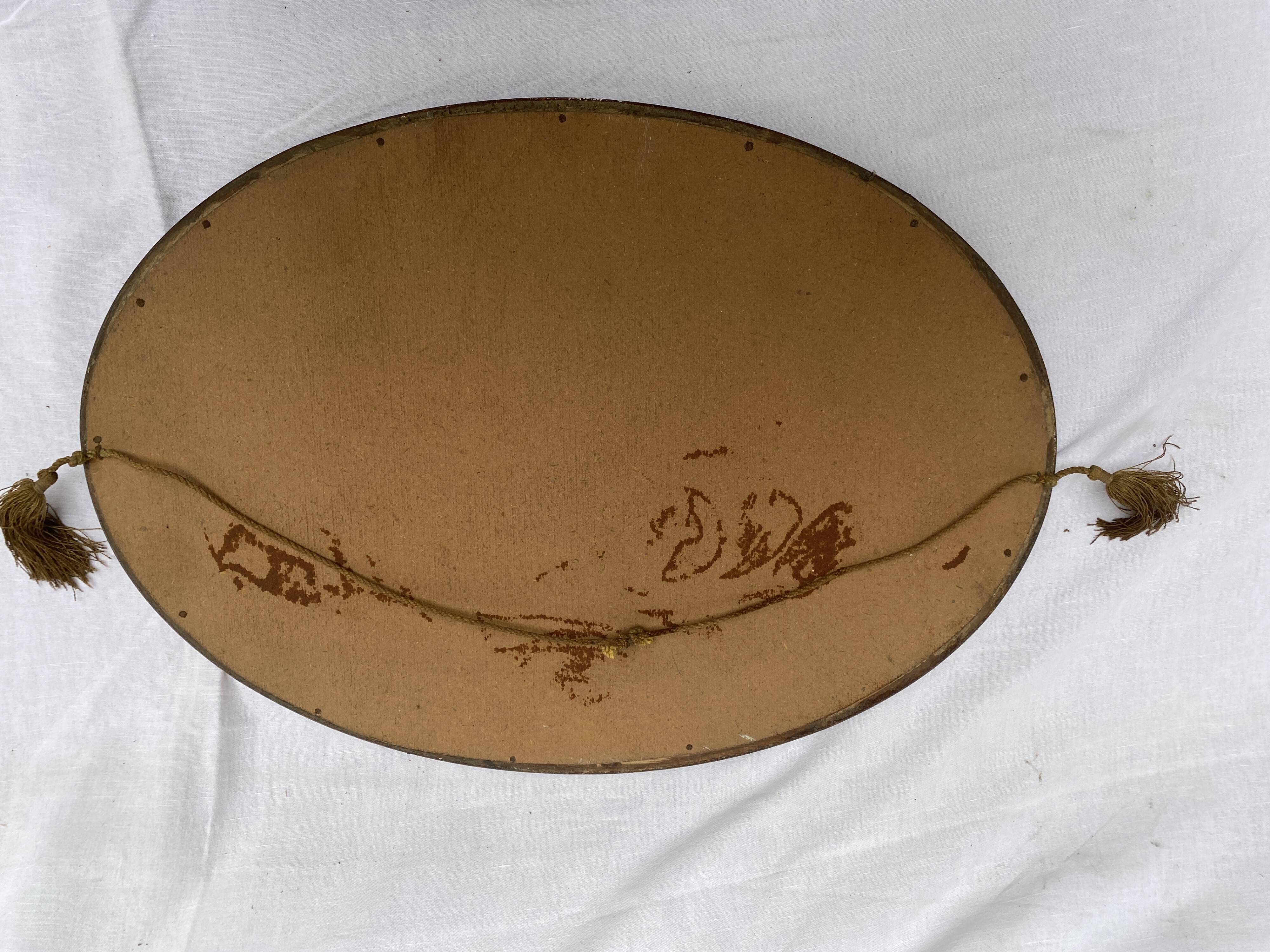 Oval mirror art deco era