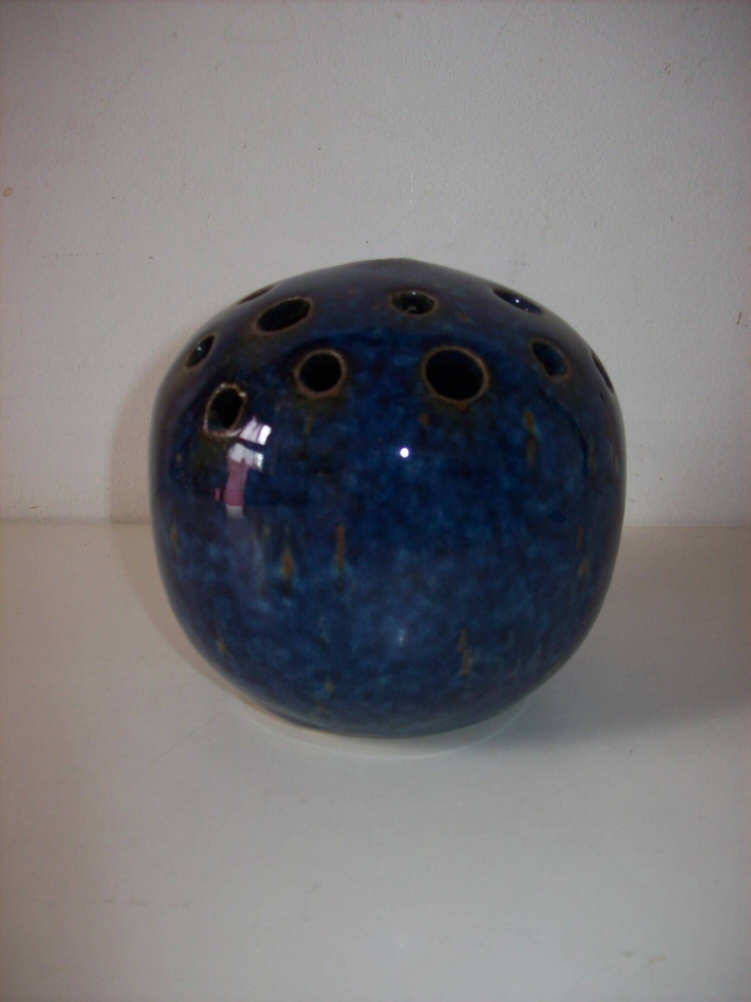 Ceramic blue flower pick