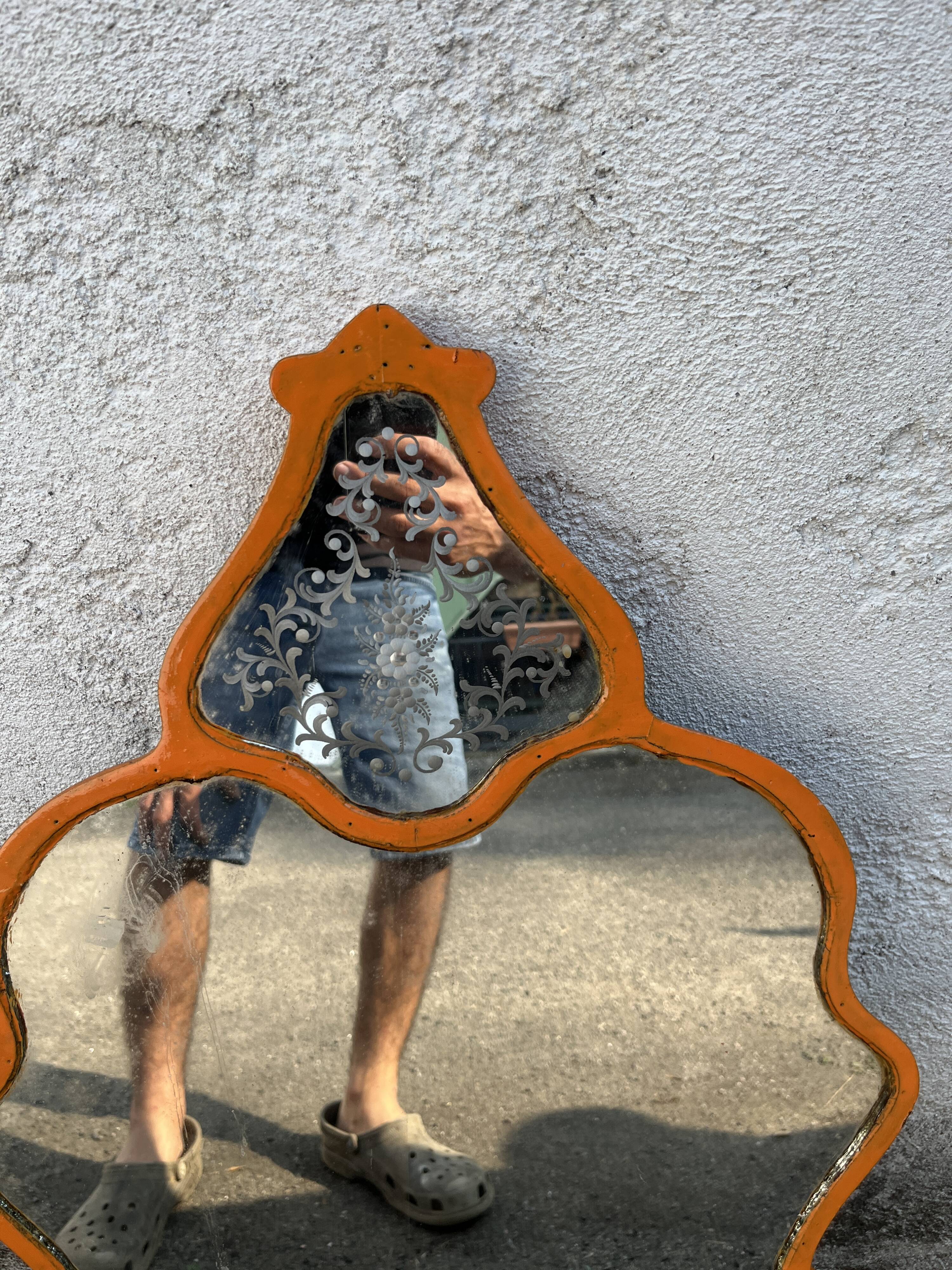 Vintage Venetian mirror, orange painted wooden frame