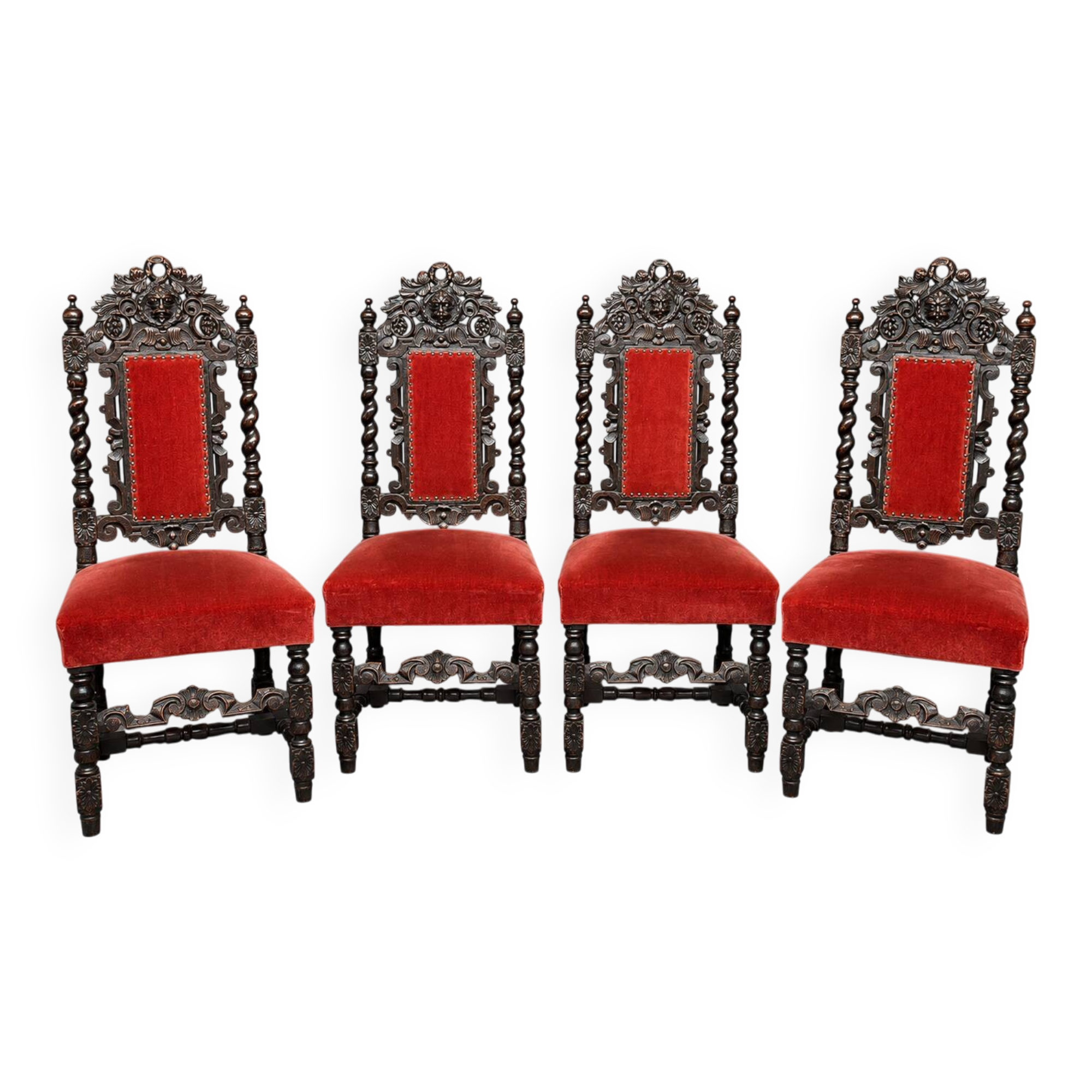Set of 4 antique Renaissance-style oak chairs.