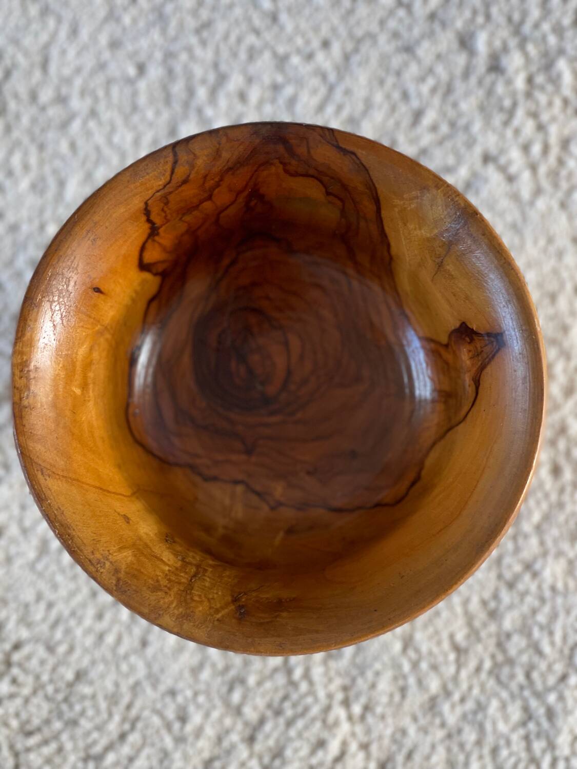 Empty pocket in olive wood