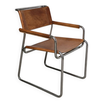 Vintage armchair in cognac leather and chrome tubular steel.