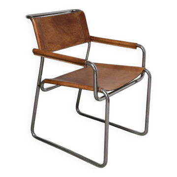 Vintage armchair in cognac leather and chrome tubular steel.