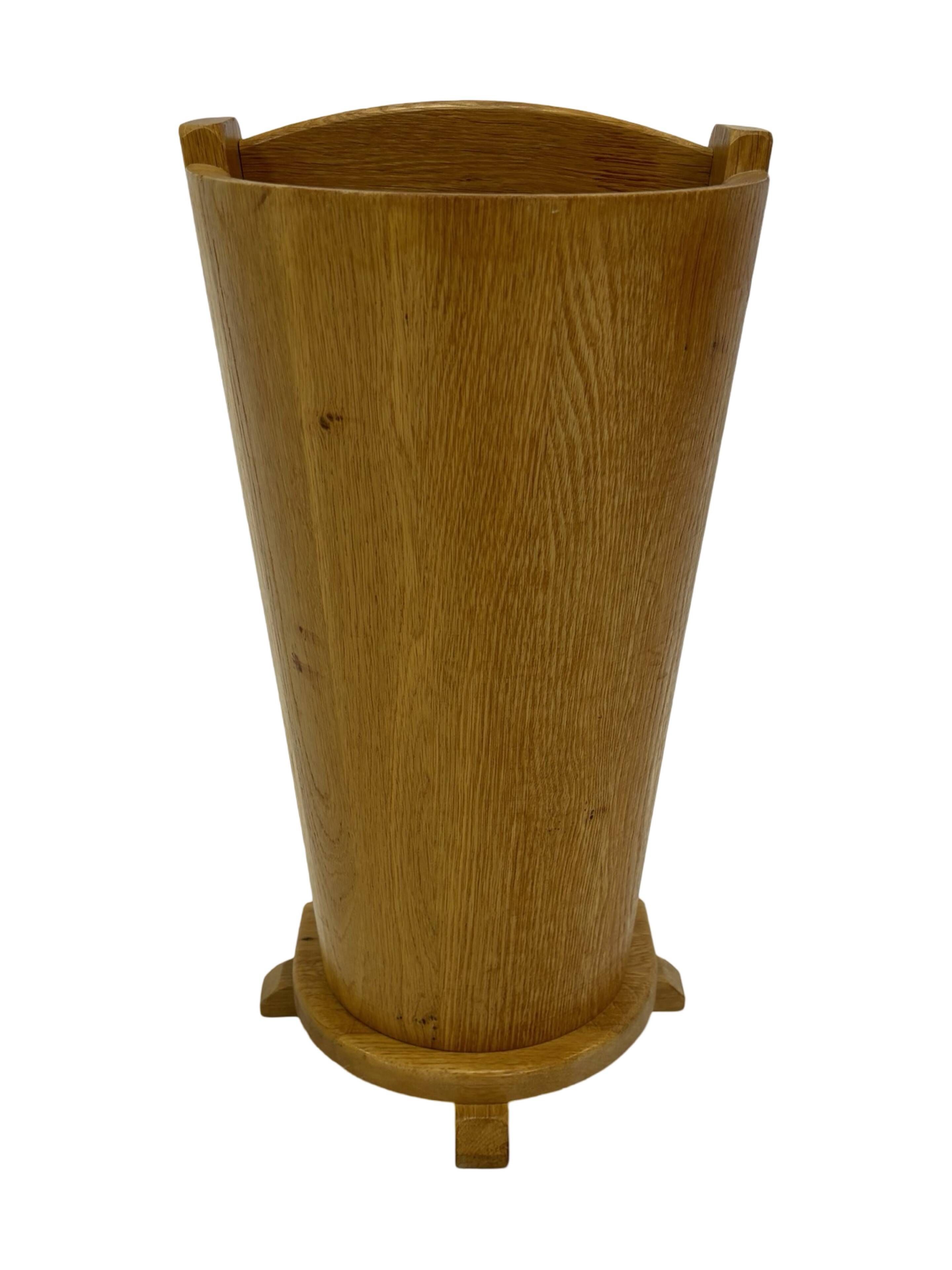 Vintage umbrella holder in oak basket storage design of the 1960s minimalist design
