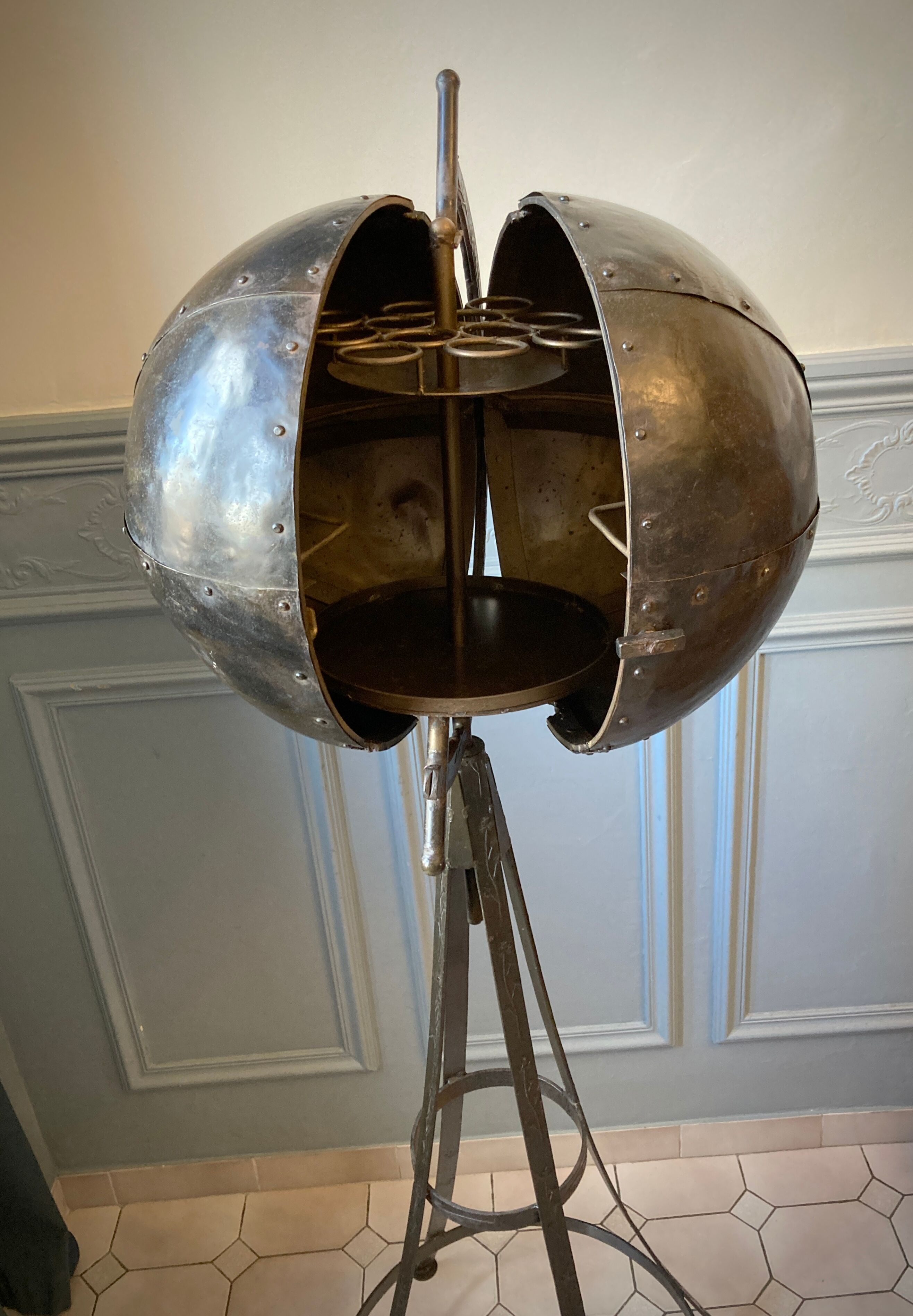 Atypical industrial furniture riveted sphere