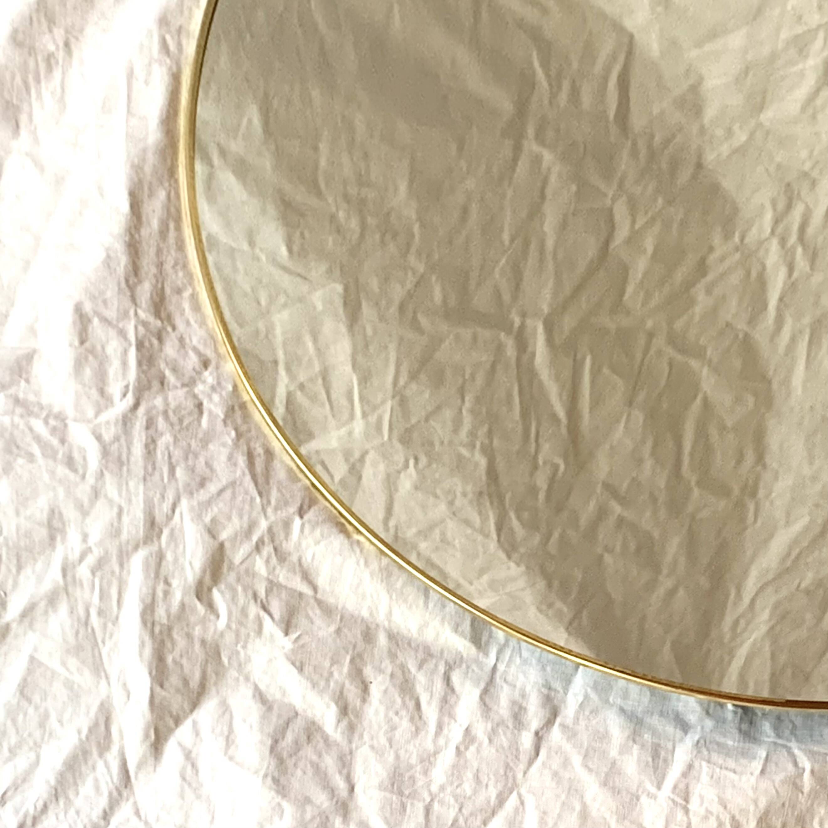 Round mirror with brass rim - 55 cm