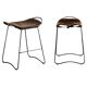 Contemporary sculptural bar stool, smoked black metal sample and black leather.