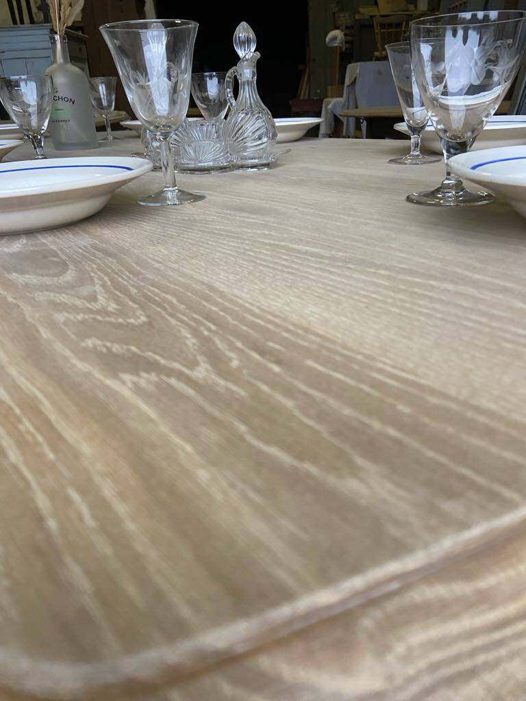 Raw wood table with black legs