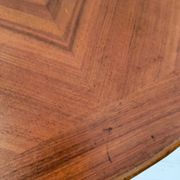Vintage folding table with turned legs.