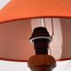 Pair of orange turned wood lamps