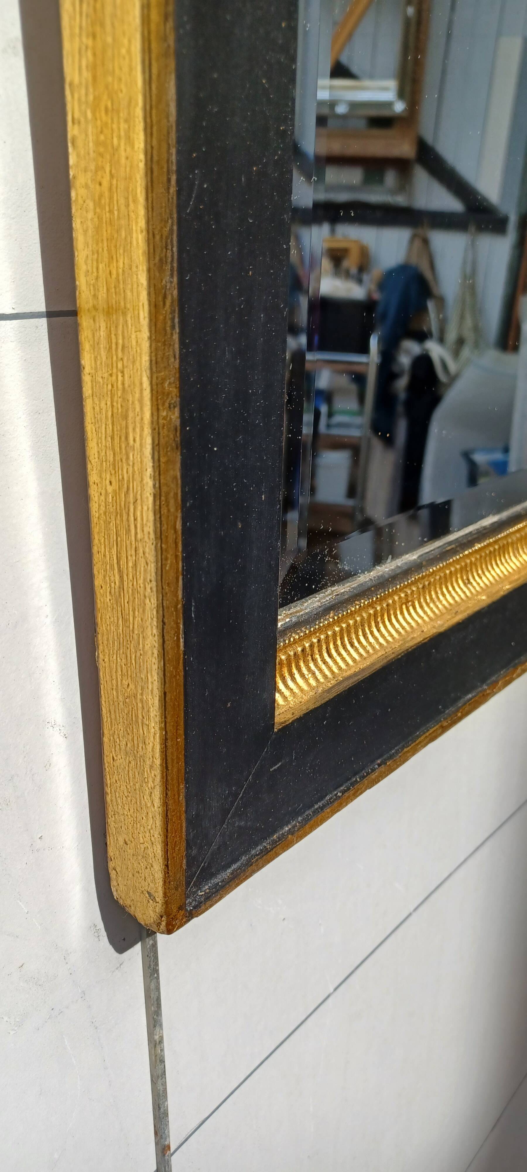 Black and gold art deco style mirror