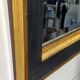 Black and gold art deco style mirror