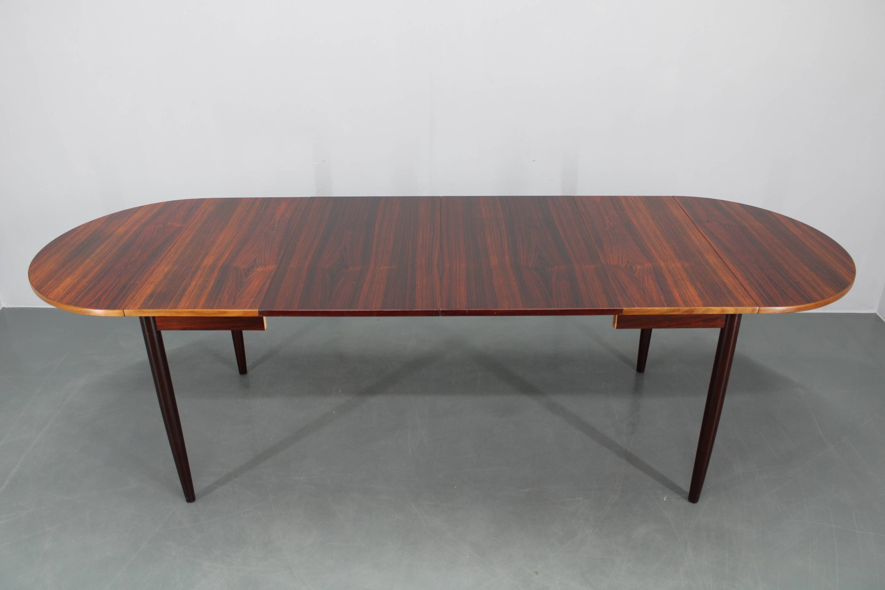 1960s Danish extendable palisander dining table, 4 leaves, restored