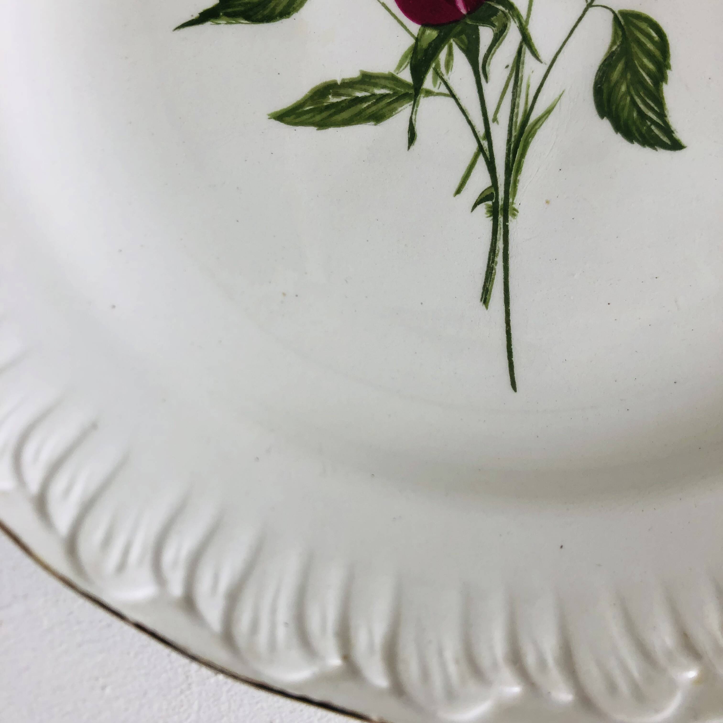 Plate by Amandinoise with a floral art deco rose motif.
