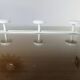 White lacquered metal wall coat rack with 3 hooks, 1970.